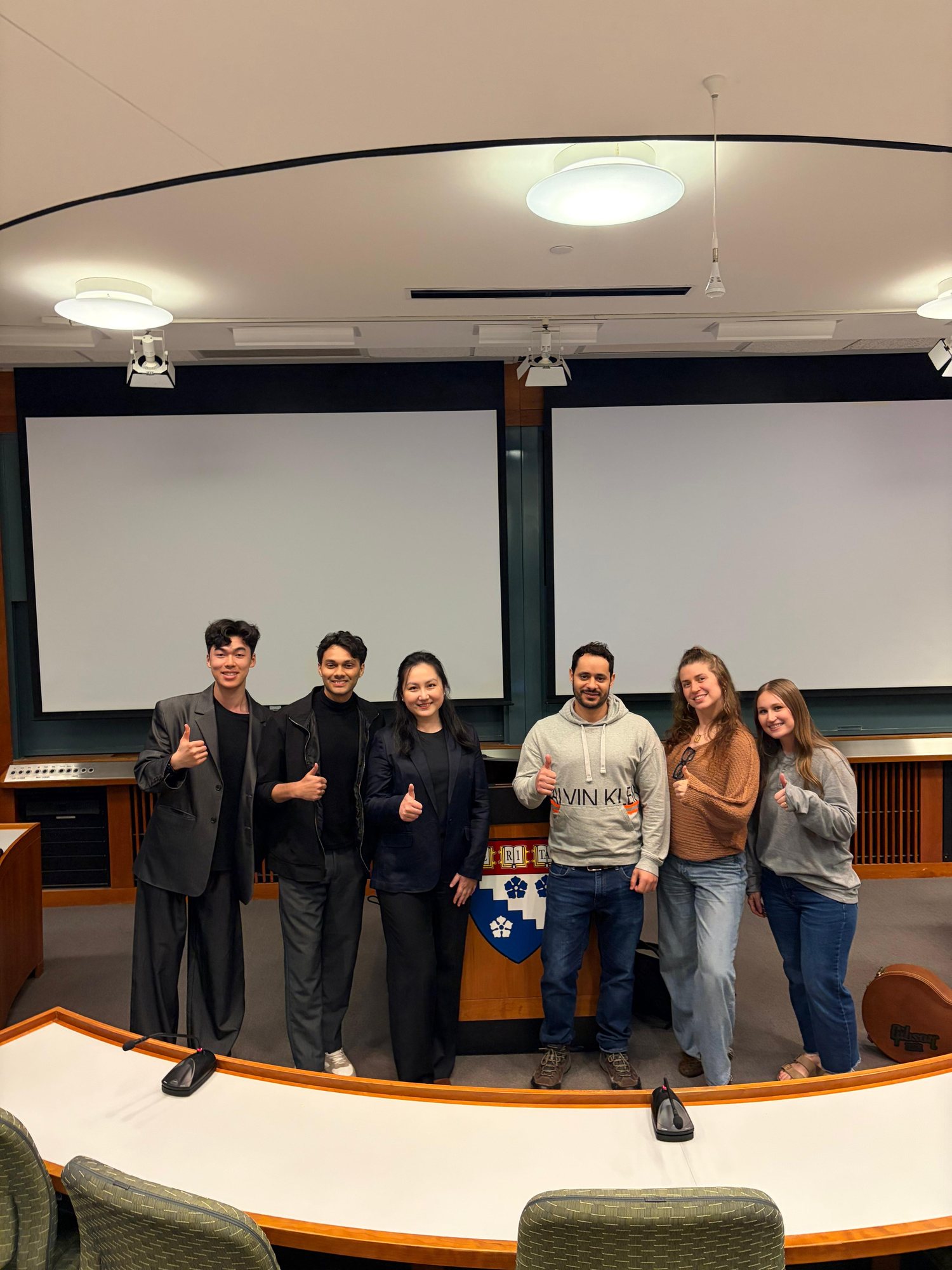 Mahdeen (Sameer) Khan with his cohort in a lecture hall at Harvard